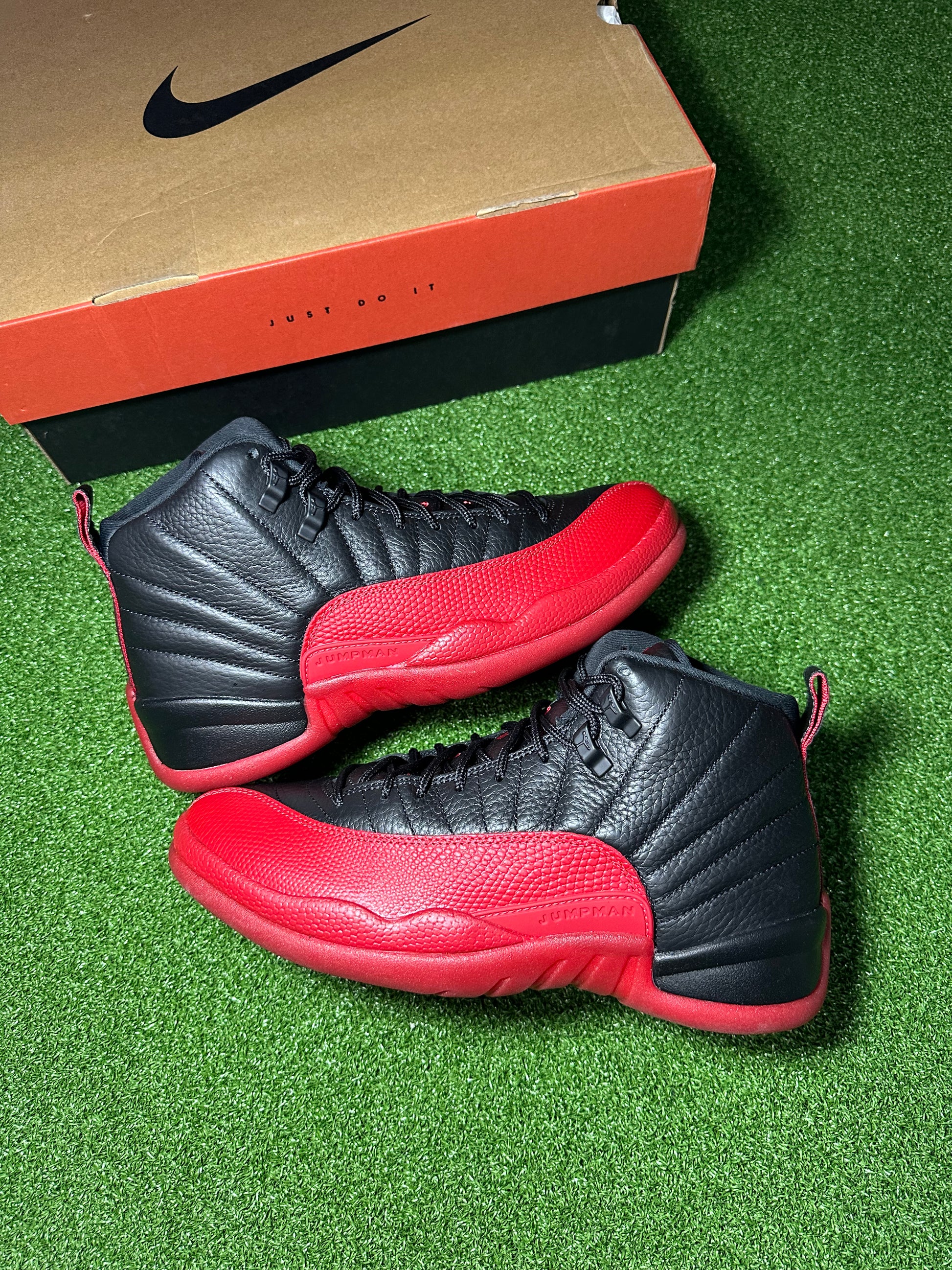 Side profile of Retro Jordan 12 Flu Game sneakers