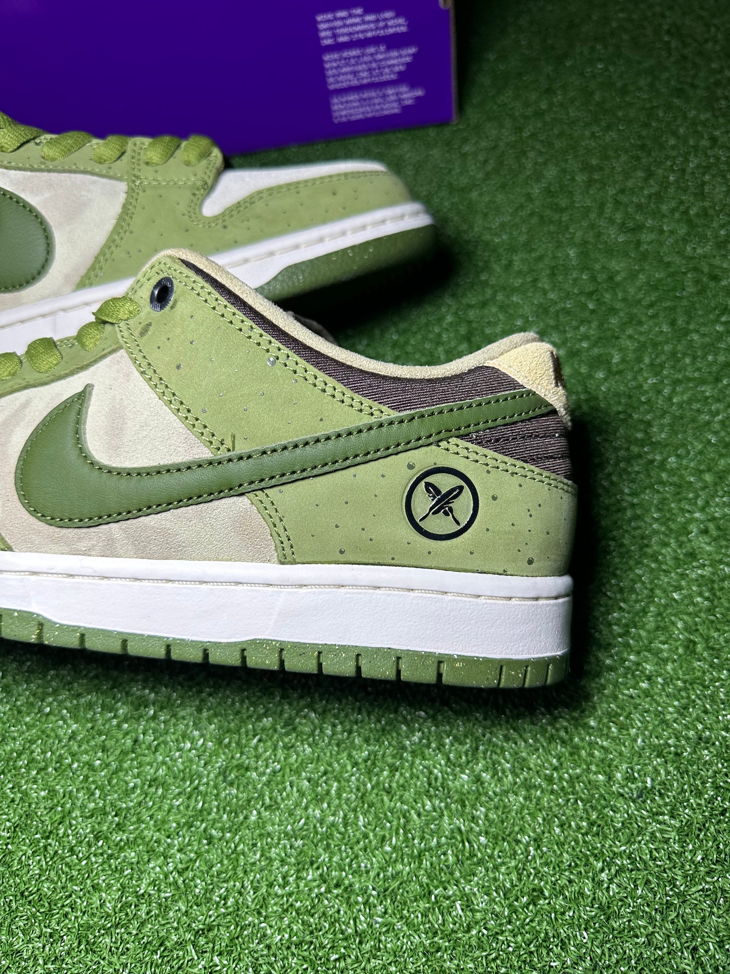logos on Yuto SB Dunk Low