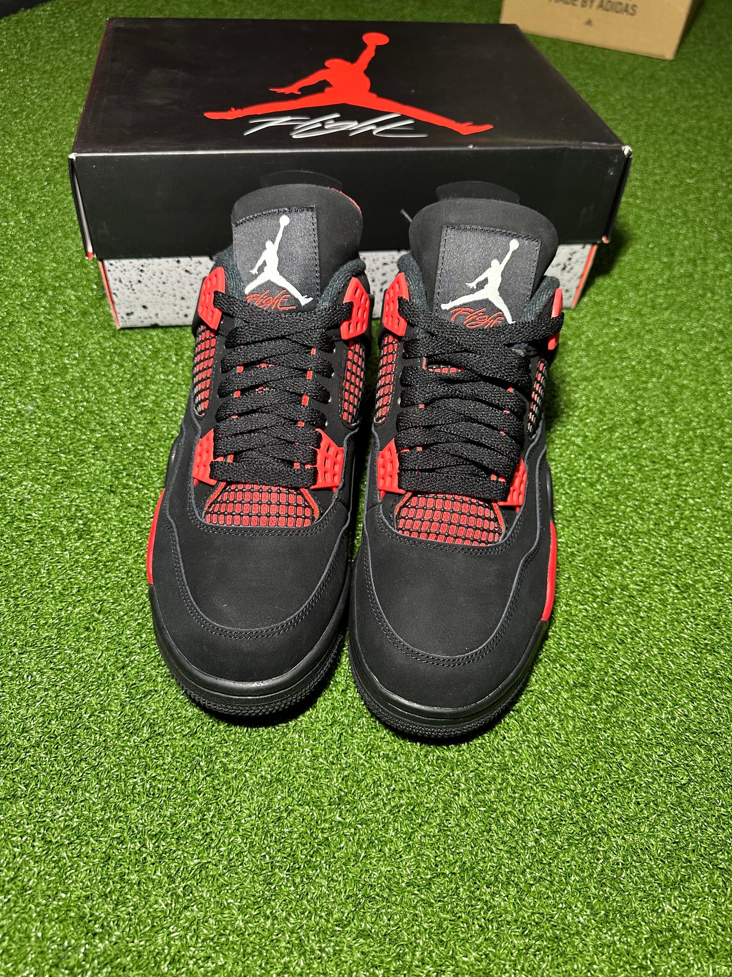 Jordan 4 Retro “Red Thunder”