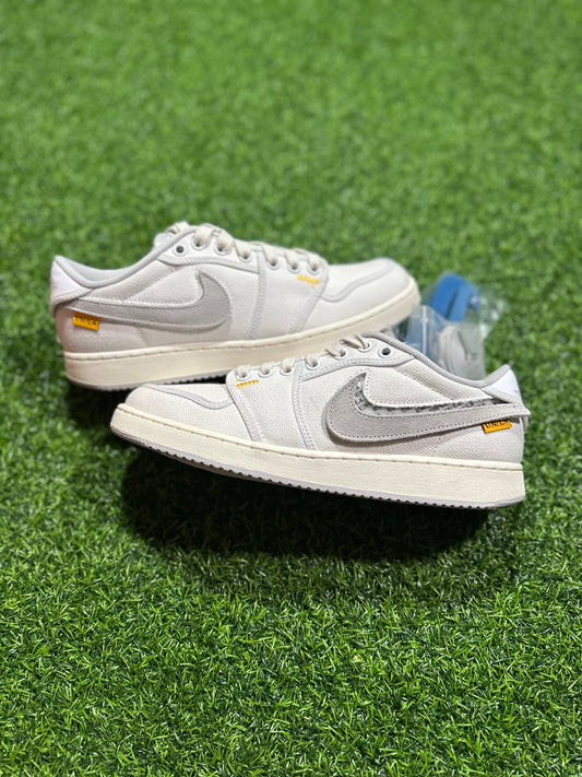 Jordan 1 Retro AJKO Low SP - Lona blanca Union