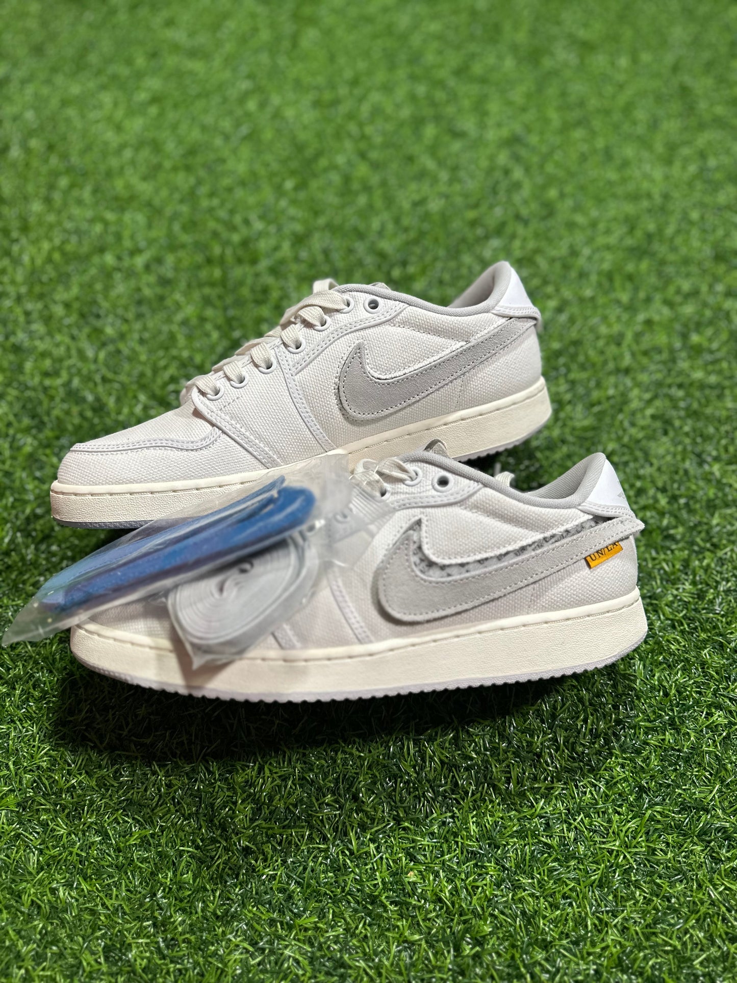 Jordan 1 Retro AJKO Low SP - Lona blanca Union