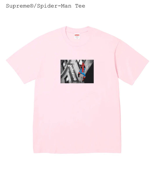 Pink t-shirt with Spider-Man graphic and Supreme branding on a white background